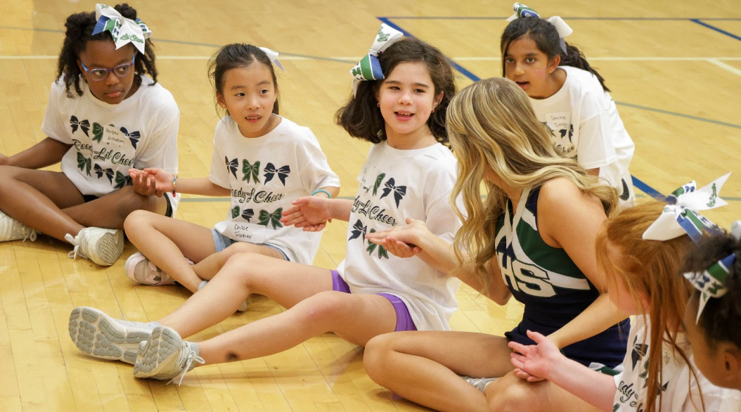 Sophomore Nina Diaz, playing the concentration game with a group of 3rd graders. Nina, having done this as a little girl, is excited to be a leader this time around. 
